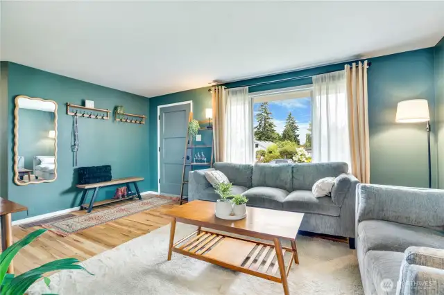 Bright natural light greets you as you enter this adorable home. Newly refinished hardwood floors flow through a majority of the home and create a calming ambiance all around.