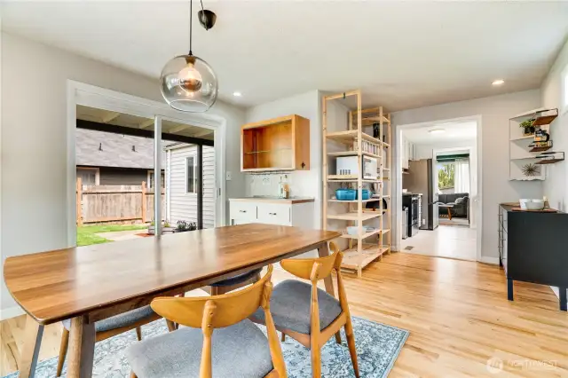Arguably the best view in the home belongs to the dining room with the oversized sliding door to the backyard! Host a party of 10, or just a party of 1 and take in the lush scenery in front of you.