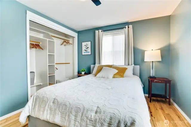 The primary bedroom also has a generously sized closet with custom shelving and space to organize your wardrobe!
