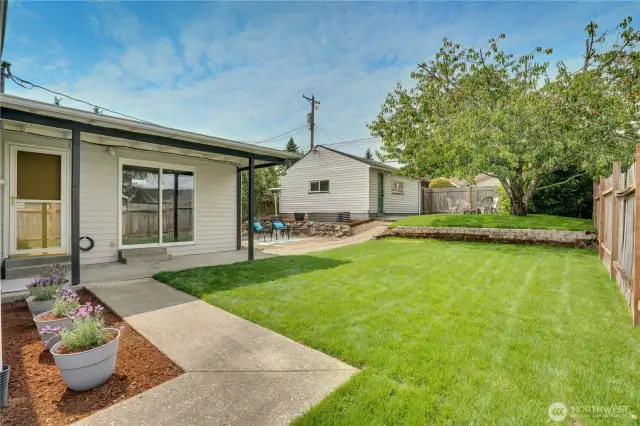 This backyard was just refreshed with new sod! Enjoy the fully fenced lot for its privacy and host your favorite guests anytime!