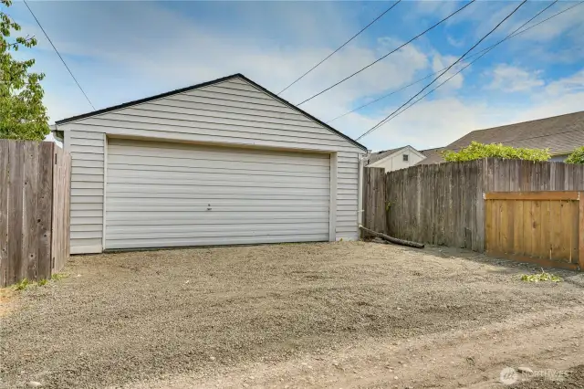 Not only does this home have a detached 2 car garage with extra workshop space, but you can park multiple vehicles outside of the garage without obstructing the alley access! Fresh gravel and grading in the alley is the cherry on top!