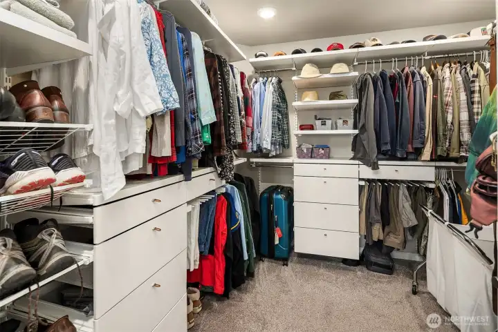 The primary closet is a dream! All custom built in's.