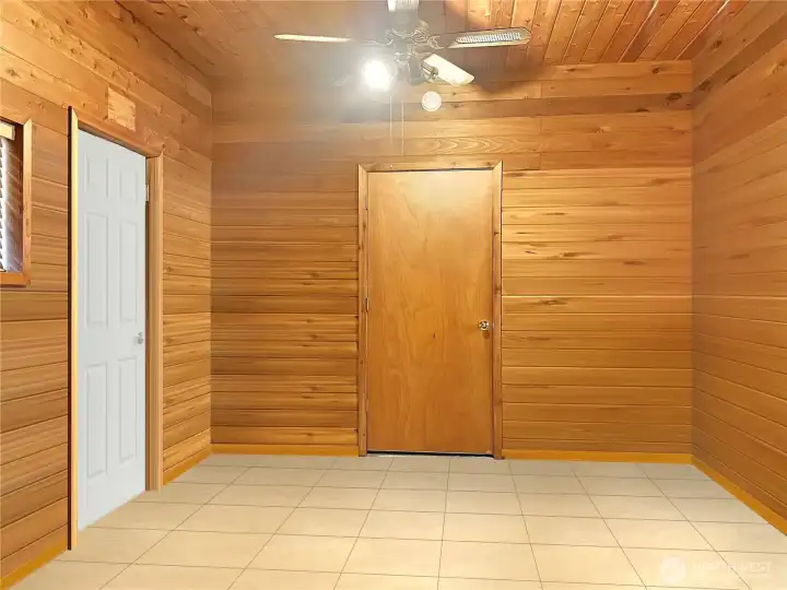 Dining room virtually removed items. white door to backyard deck. brown door to Primary bedroom.