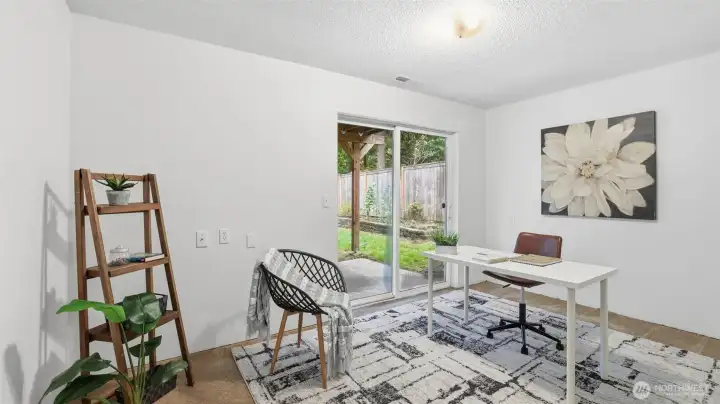 Peaceful and private flex room with direct patio access — perfect for work or relaxation.