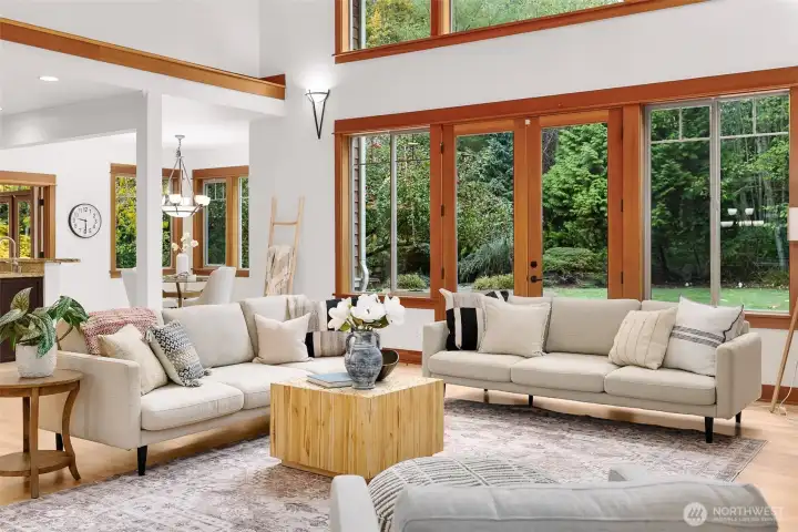 French doors lead to impressive back deck & patio for entertaining