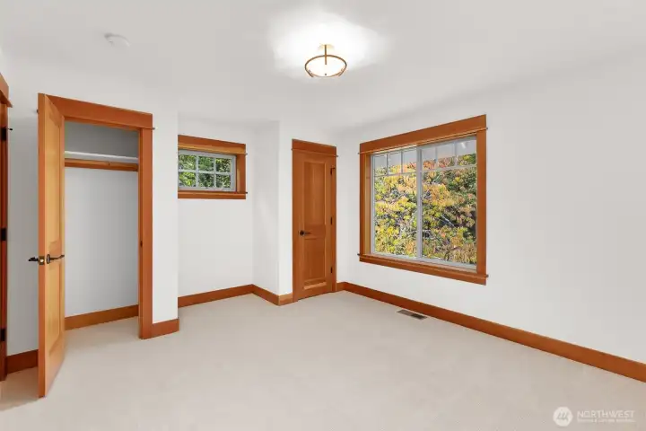 2nd Bedroom on the upper level features two closets