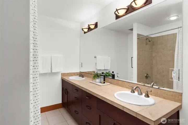 Jack and Jill bathroom connects the 2nd and 3rd bedroom on upper level