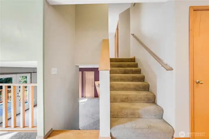 Now, let's walk up the stairs to where the three bedrooms are located.....follow me....