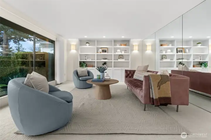 Living room with floor to ceiling windows