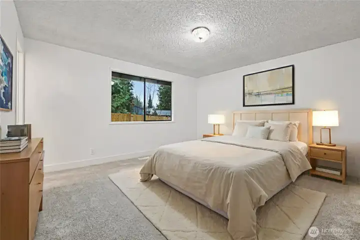 Virtually staged Main floor master suite