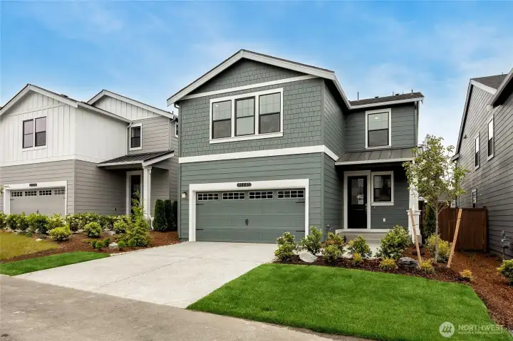 2-Car garage with 50AMP EV plug. Photo is representational. Actual home is under construction and finishes and paint colors may vary. See site agent for details.... 2-Car garage with 50AMP EV plug. Photo is representational. Actual home is under construction and finishes and paint colors may vary. See site agent for details....