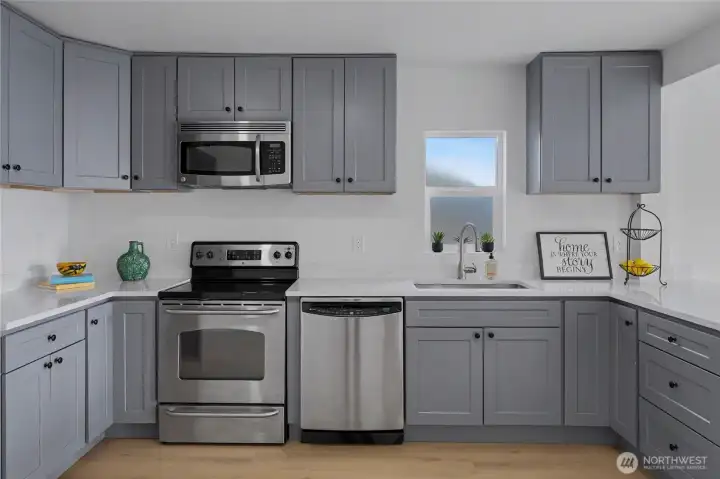 Kitchen with brand new cabinets and quartz countertops