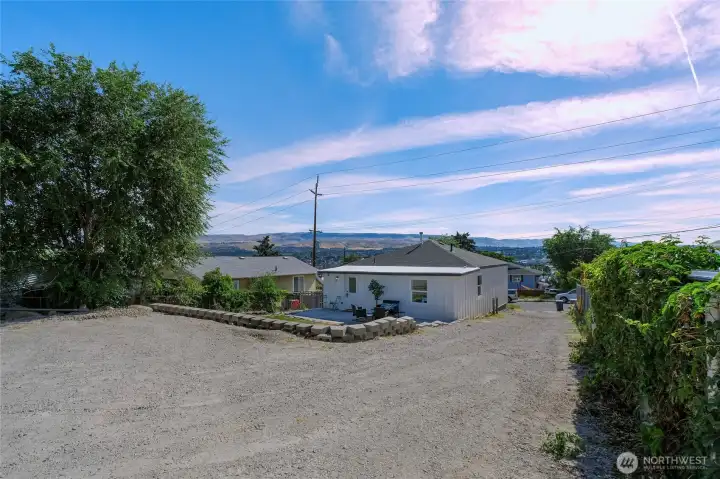 Extra wide driveway and rear parking Extra wide driveway and rear parking