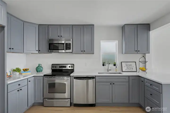 Kitchen with brand new cabinets and quartz countertops Kitchen with brand new cabinets and quartz countertops