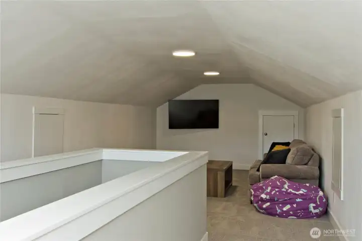 Spacious upstairs bonus room.