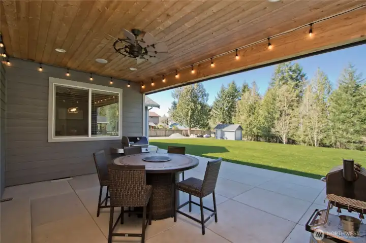 Covered patio with surround sound and private outdoor entertaining space.