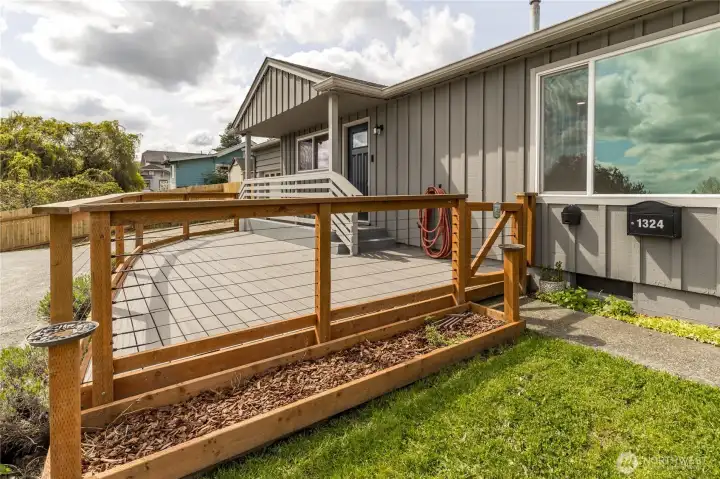 The front deck was completely rebuilt in 2025 with poured footings, new framing and a new railing.