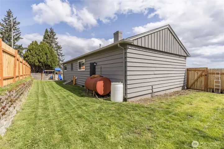 Lush lawn on 3 sides of the home