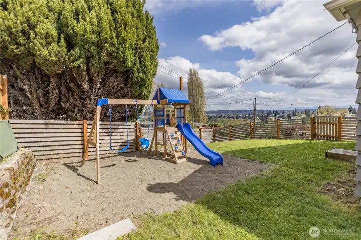 New in 2025: Dedicated play area with high-end playset, all set against a backdrop of sweeping valley views