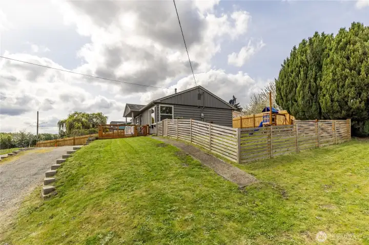 Quiet living on a large lot, thoughtfully set back from the road to maximize privacy and take advantage of the valley views