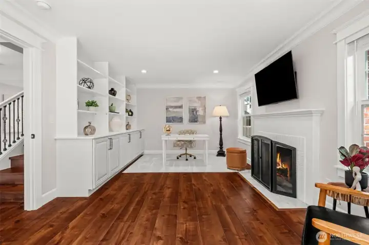 Nice built-in cabinetry with another fireplace