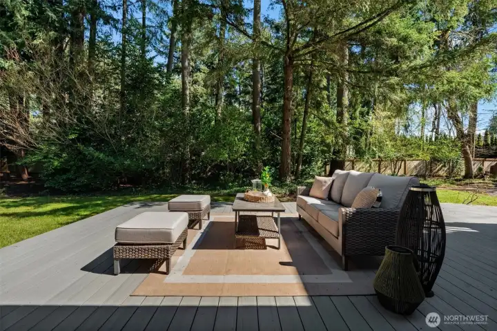 Downstairs patio overlooking the Pickleball court
