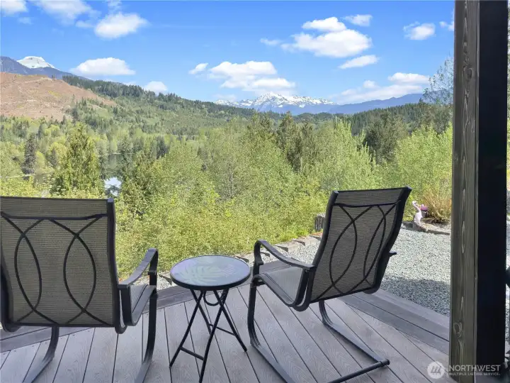Enjoy coffee or cocktails with the mountain and lake views