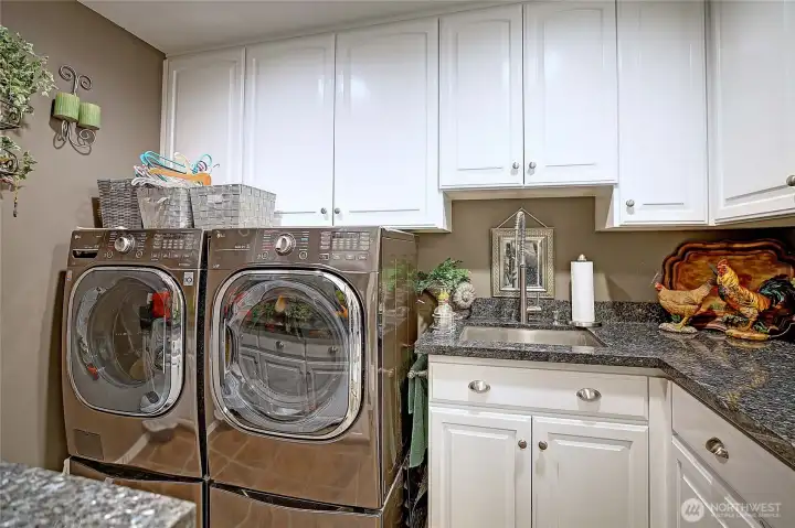 Laundry room with granite benchtops