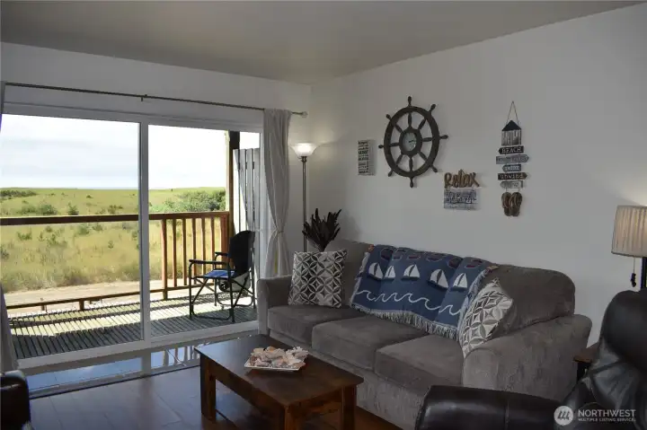 Beautifully furnished great room with ocean and dunes view