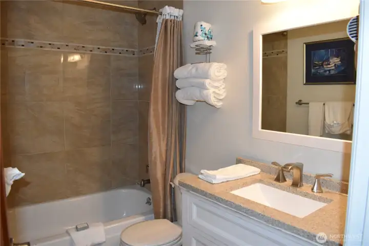Full bath in the hall.