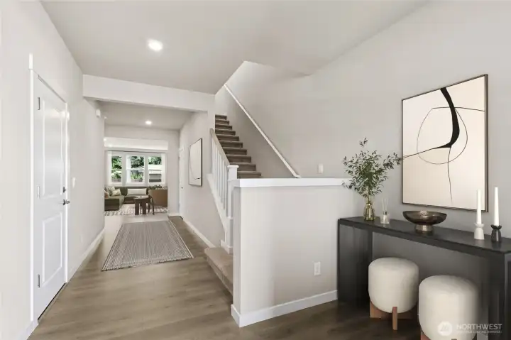 Virtual staging. Main floor entry.  Photos are for representation purposes only.