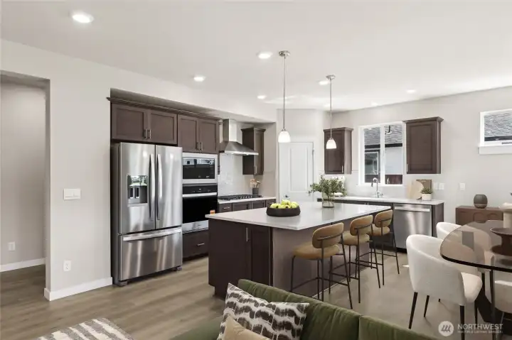 Modern kitchens with slab quartz counters and soft close doors and drawers. Virtual staging.