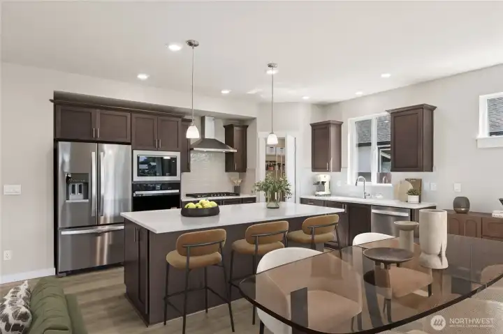 5 burner gas range and stainless steel appliances. Virtual staging