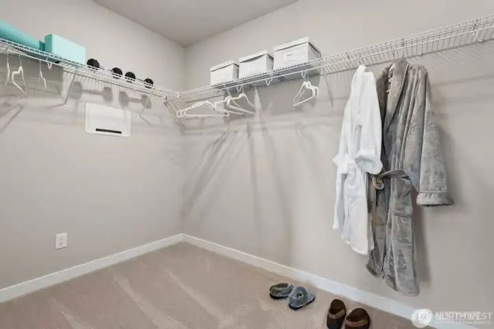 Large walk in primary closet.