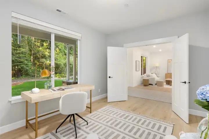 The main-level office provides a quiet, versatile space ideal for working from home, managing daily tasks, or creating a cozy den. The main-level office provides a quiet, versatile space ideal for working from home, managing daily tasks, or creating a cozy den.