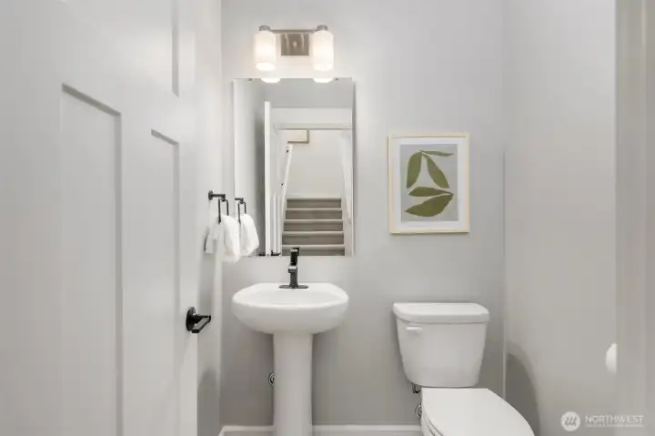 The half bath off on the main floor. The half bath off on the main floor.