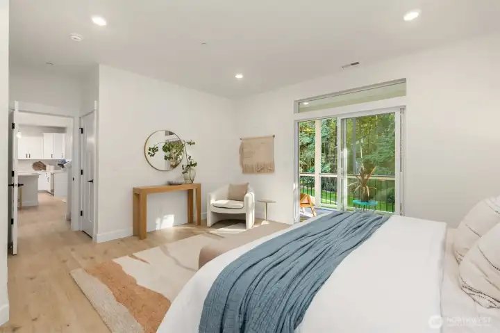 The spacious primary suite is conveniently located on the main level, offering comfort, privacy, and easy single-level living. The spacious primary suite is conveniently located on the main level, offering comfort, privacy, and easy single-level living.