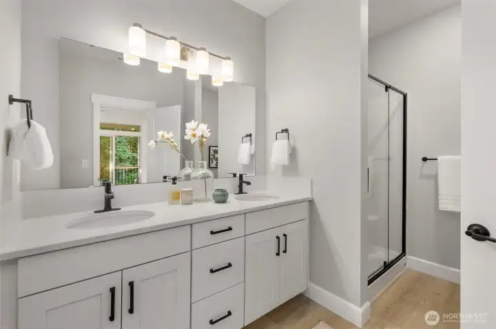 The 5-piece ensuite offers a private retreat with a spacious layout designed for relaxation and comfort. Featuring a well-appointed soaking tub, separate shower, dual vanities, and thoughtful finishes. The 5-piece ensuite offers a private retreat with a spacious layout designed for relaxation and comfort. Featuring a well-appointed soaking tub, separate shower, dual vanities, and thoughtful finishes.
