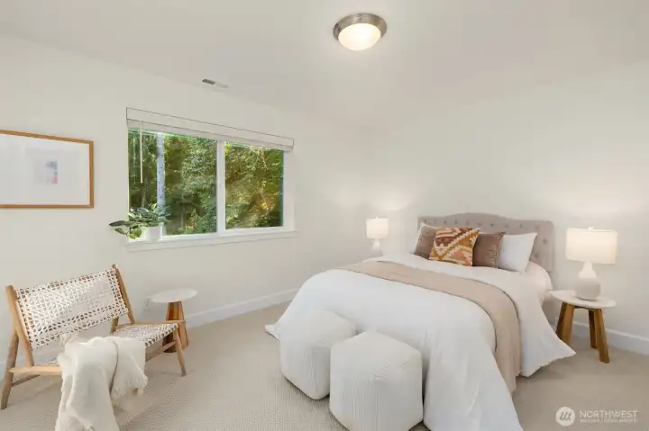 Bedroom 4 looks out over the backyard and greenspace. Bedroom 4 looks out over the backyard and greenspace.