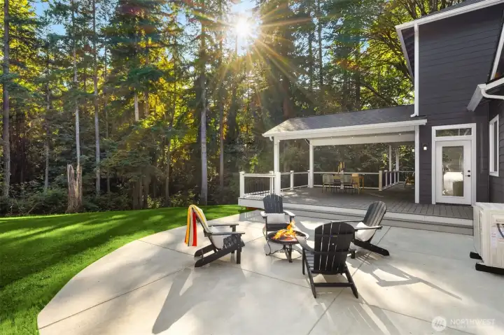 The outdoor firepit offers a peaceful gathering space overlooking the natural forest, creating the perfect setting for relaxing evenings, entertaining guests, and enjoying the beauty of the surrounding landscape. The outdoor firepit offers a peaceful gathering space overlooking the natural forest, creating the perfect setting for relaxing evenings, entertaining guests, and enjoying the beauty of the surrounding landscape.
