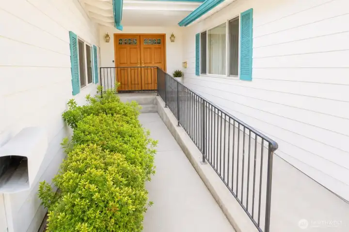 No steps entry.  What a rare find!  Double doors into a quality built home with economical gas heat, gas fireplace, lots of light with Solatubes and newer millworker.