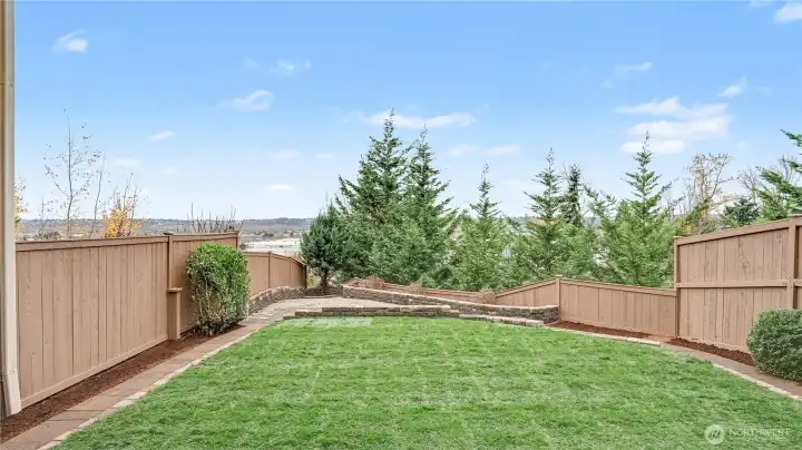 Fully fenced backyard provides privacy, security, and peaceful outdoor living.
