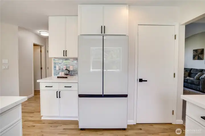 A spacious pantry, abundant storage, and thoughtful workspace make this kitchen as functional for everyday living as it is for entertaining.
