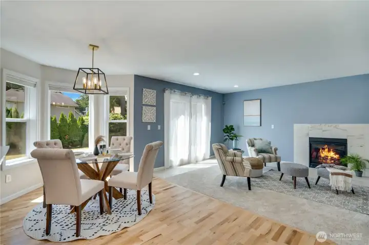 The breakfast area flows seamlessly into the family room, creating flexible gathering space that keeps everyone connected throughout the day.