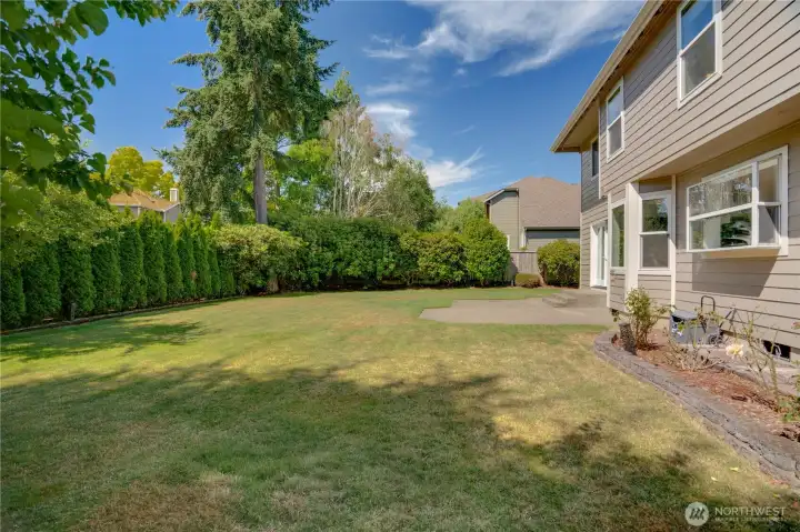 The spacious lawn and patio extend your living space outside, creating plenty of room to entertain, relax, or simply enjoy the Pacific Northwest seasons.
