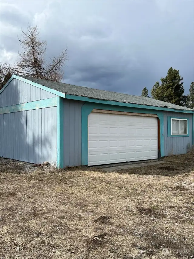 Southeastern view of car garage.