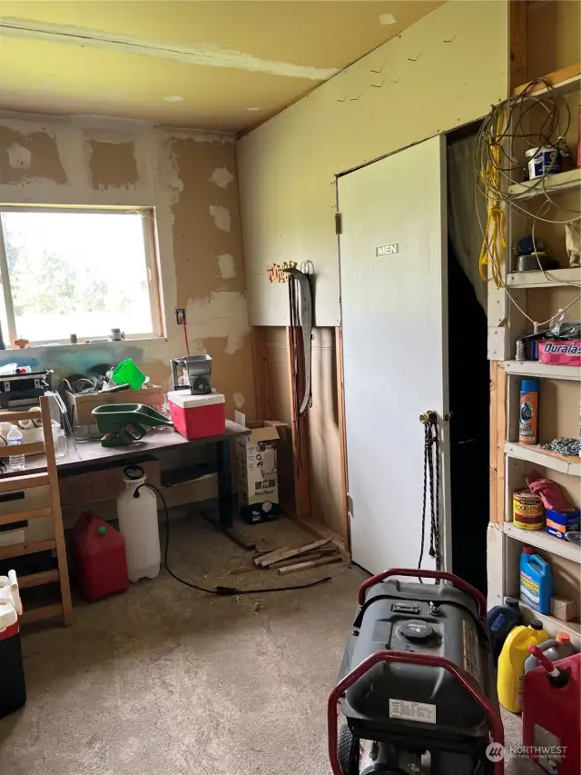 Storage shelves and shop bench for projects.