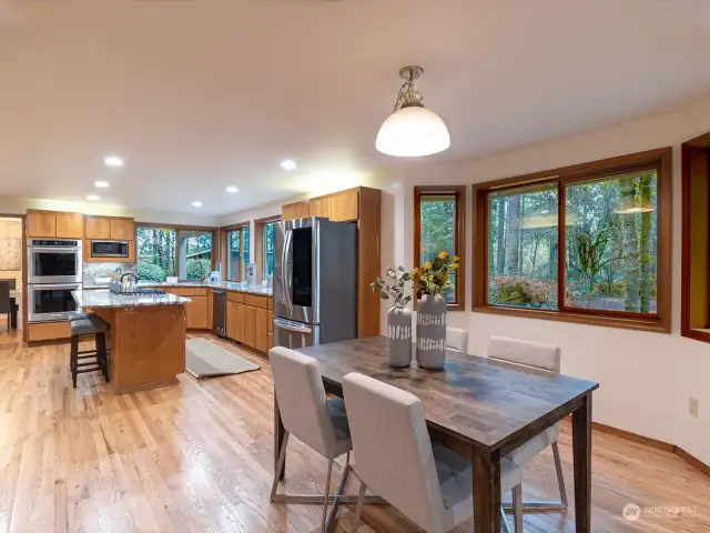 Large kitchen with Chefs island, informal dining area with bay window, walk in pantry and secondary pantry area. Double oven and new stainless steel appliances.