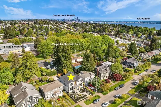 Experience the vibrant lifestyle of Magnolia, where convenient amenities are just moments away. This photo highlights the home's prime location, offering easy access to the charming Magnolia Village and the dynamic energy of Downtown Seattle.