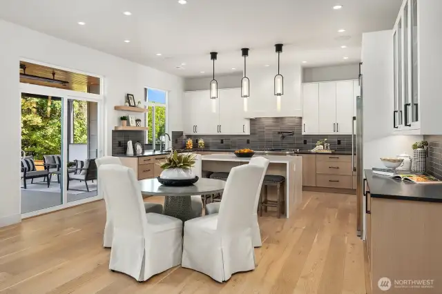 Indoor/ Outdoor Entertaining is easy in this home with the large covered deck located through the slider.